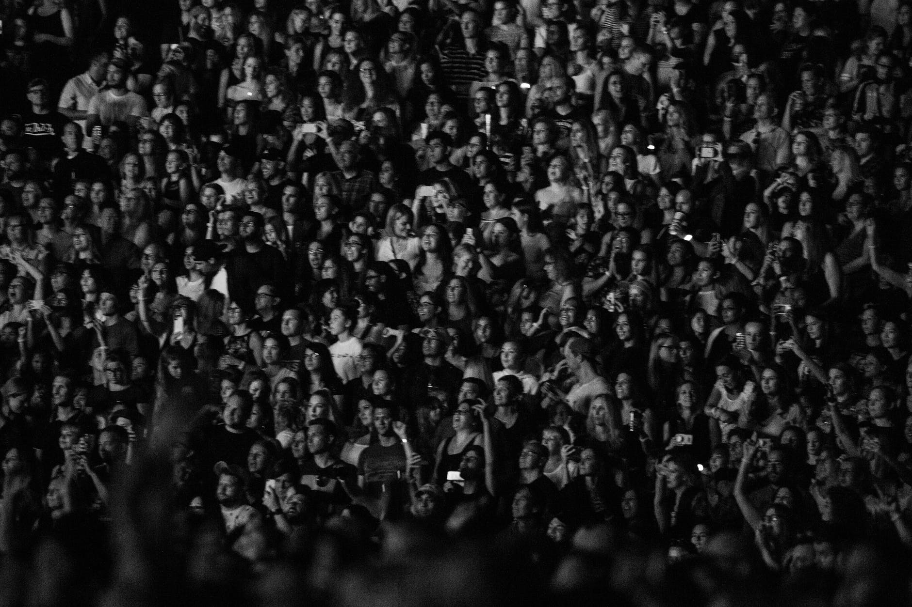 Full hall of people during the presentation