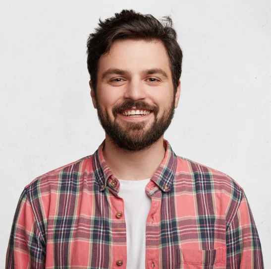 Happy client testimonial section for a modern architecture and design studio with a portrait of a smiling man in a plaid shirt