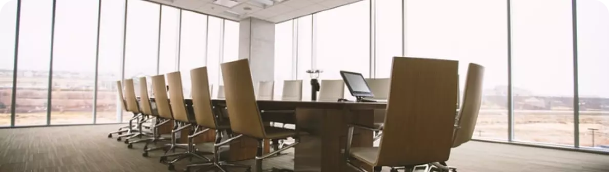 office room with a table and many chairs